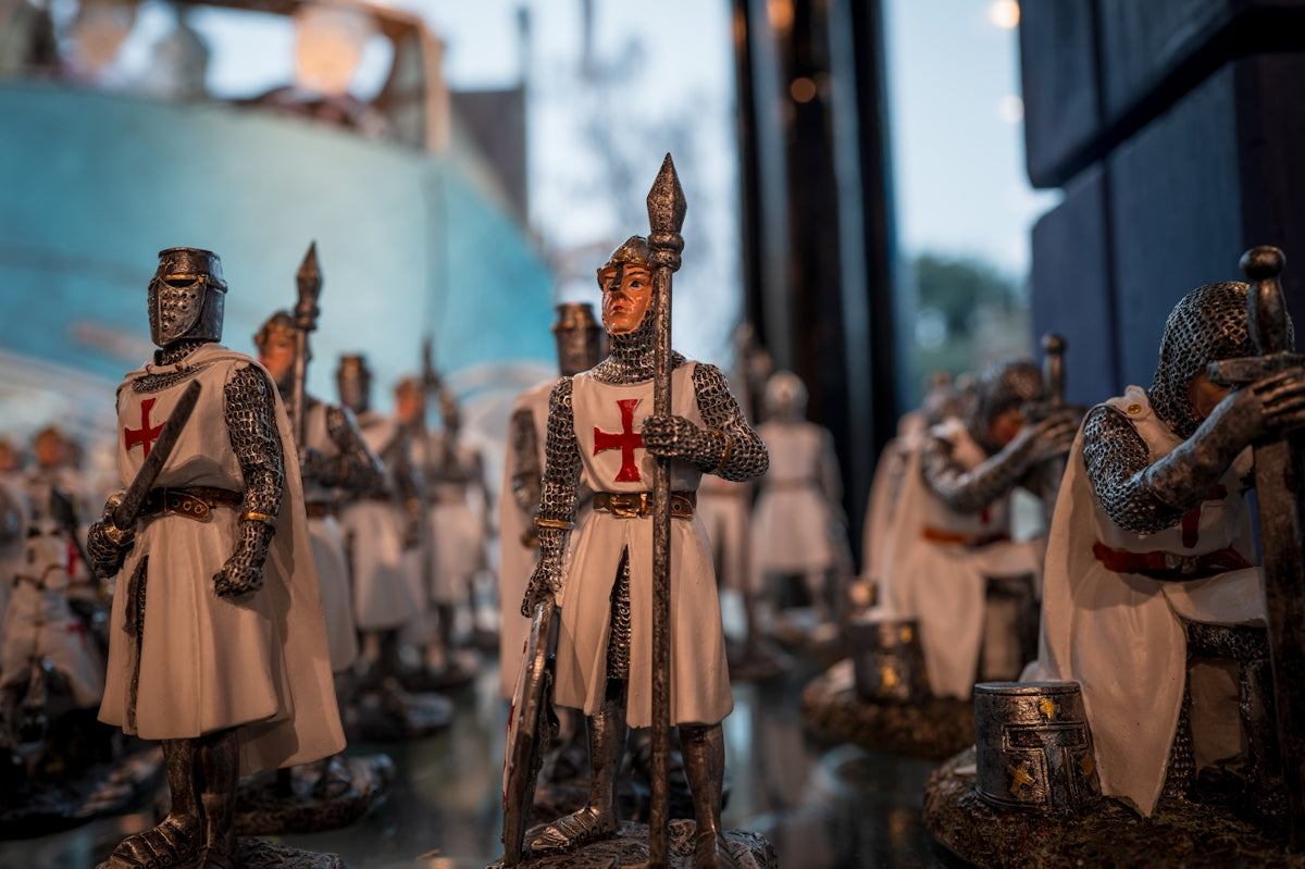 A group of toy knights standing next to each other
